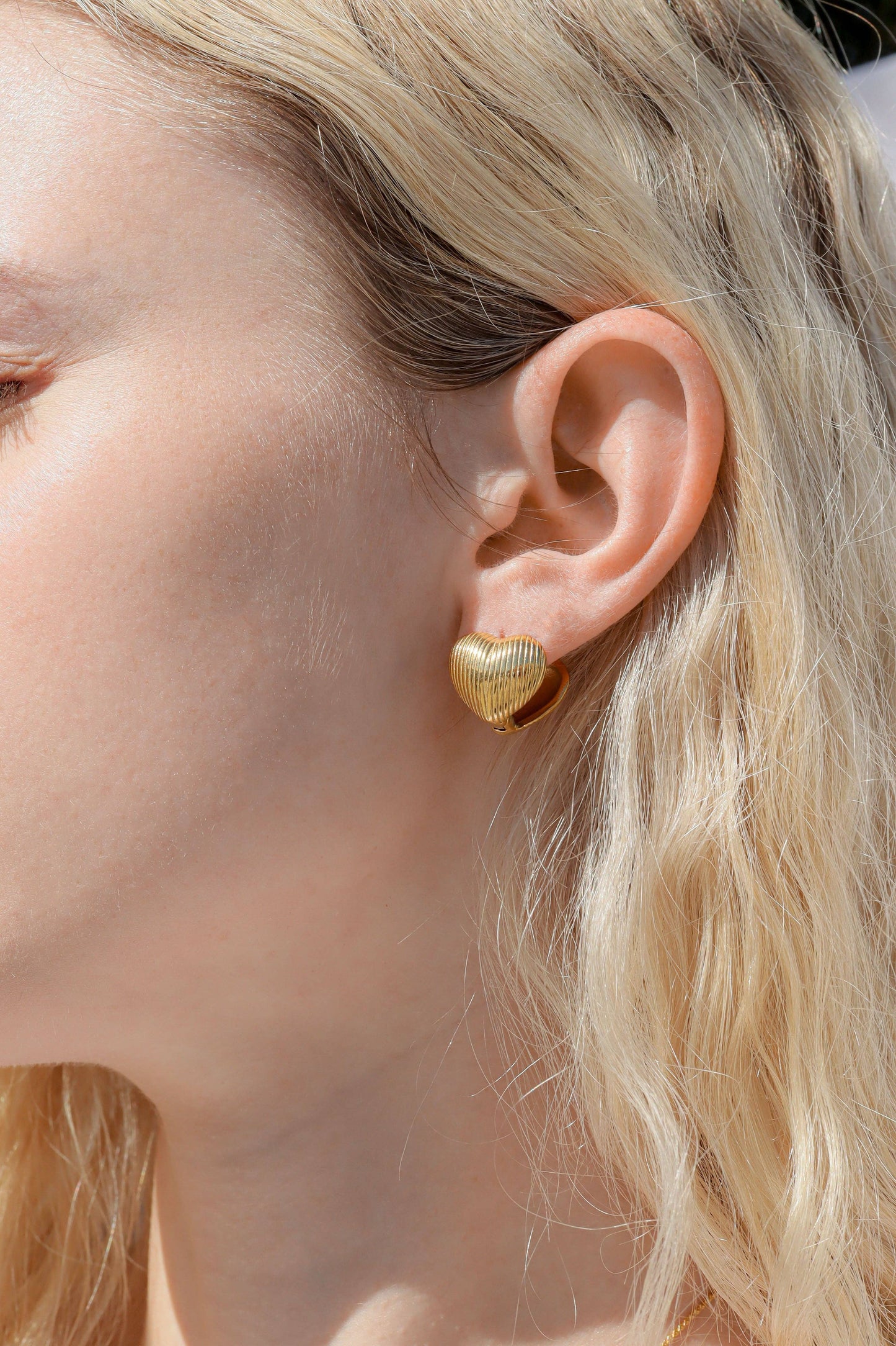 18K Gold PVD Stainless Steel Heart Huggie Earrings: Silver/Gold